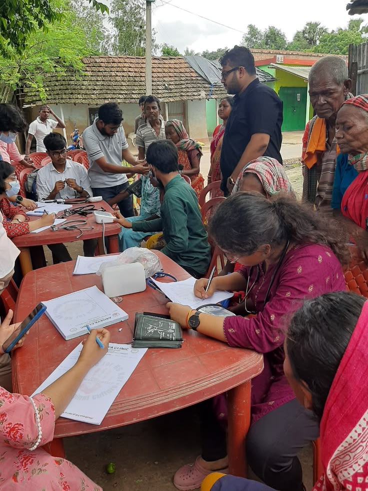 Healthcare workers conducting a community health camp