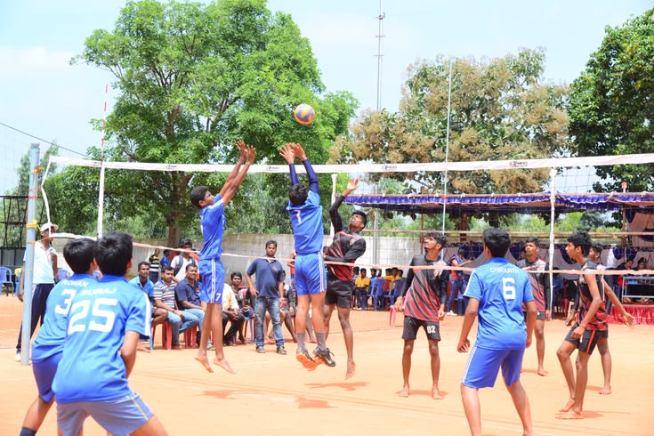 Volleyball match with young players on an outdoor court